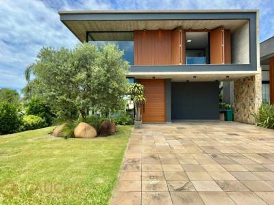 Casa em Condomínio 4 dormitórios para venda, Centro em Xangri-lá | Ref.: 10597